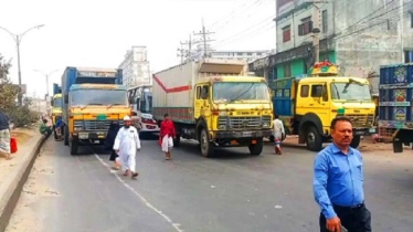 দেড় ঘণ্টা পর মহাসড়ক ছাড়লেন শ্রমিকরা